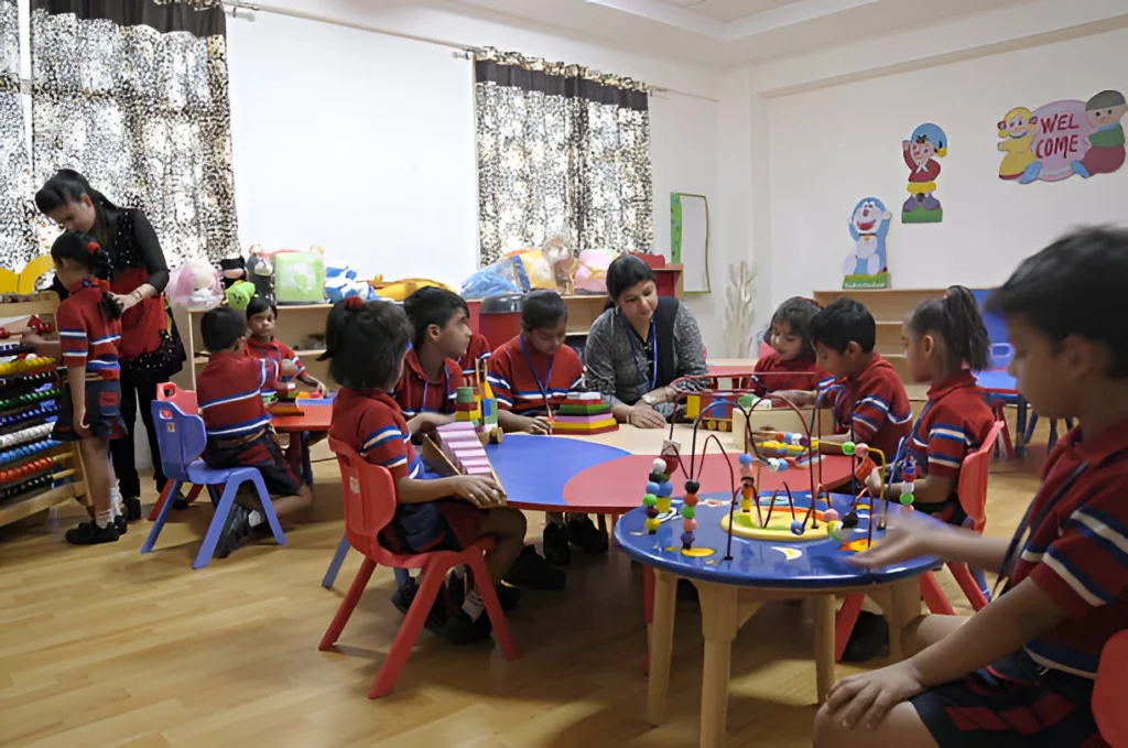 Preschool teacher training classroom session with children engaged in learning activities.