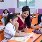 ECCED course classroom with teacher guiding students in early childhood education session.