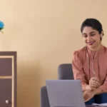 Student attending Online Counselling Courses on a laptop from home