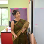 ECCE teacher , teaching in a classroom