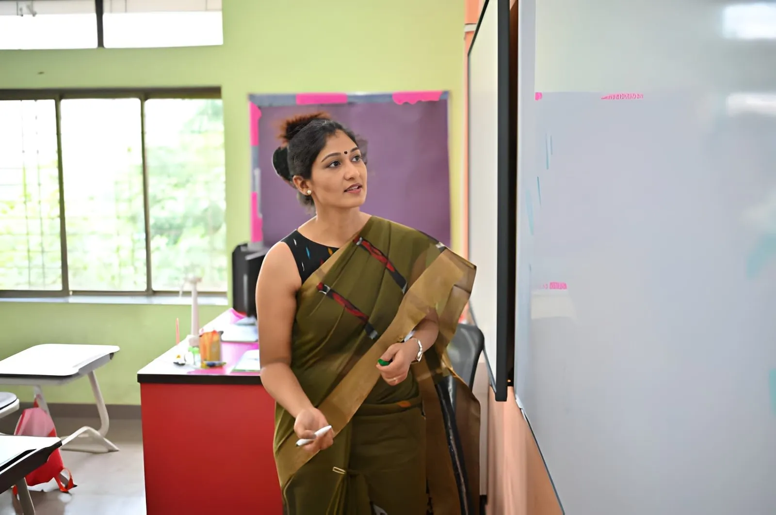 ECCE teacher , teaching in a classroom