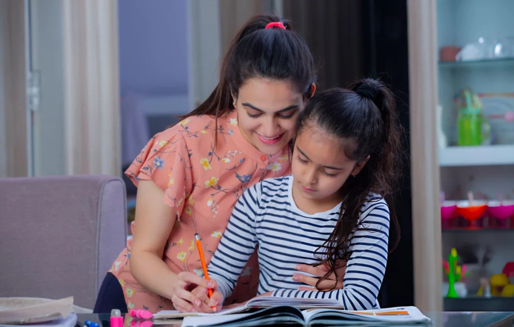 Child Psychology course helping a teacher guide a young child during a learning activity