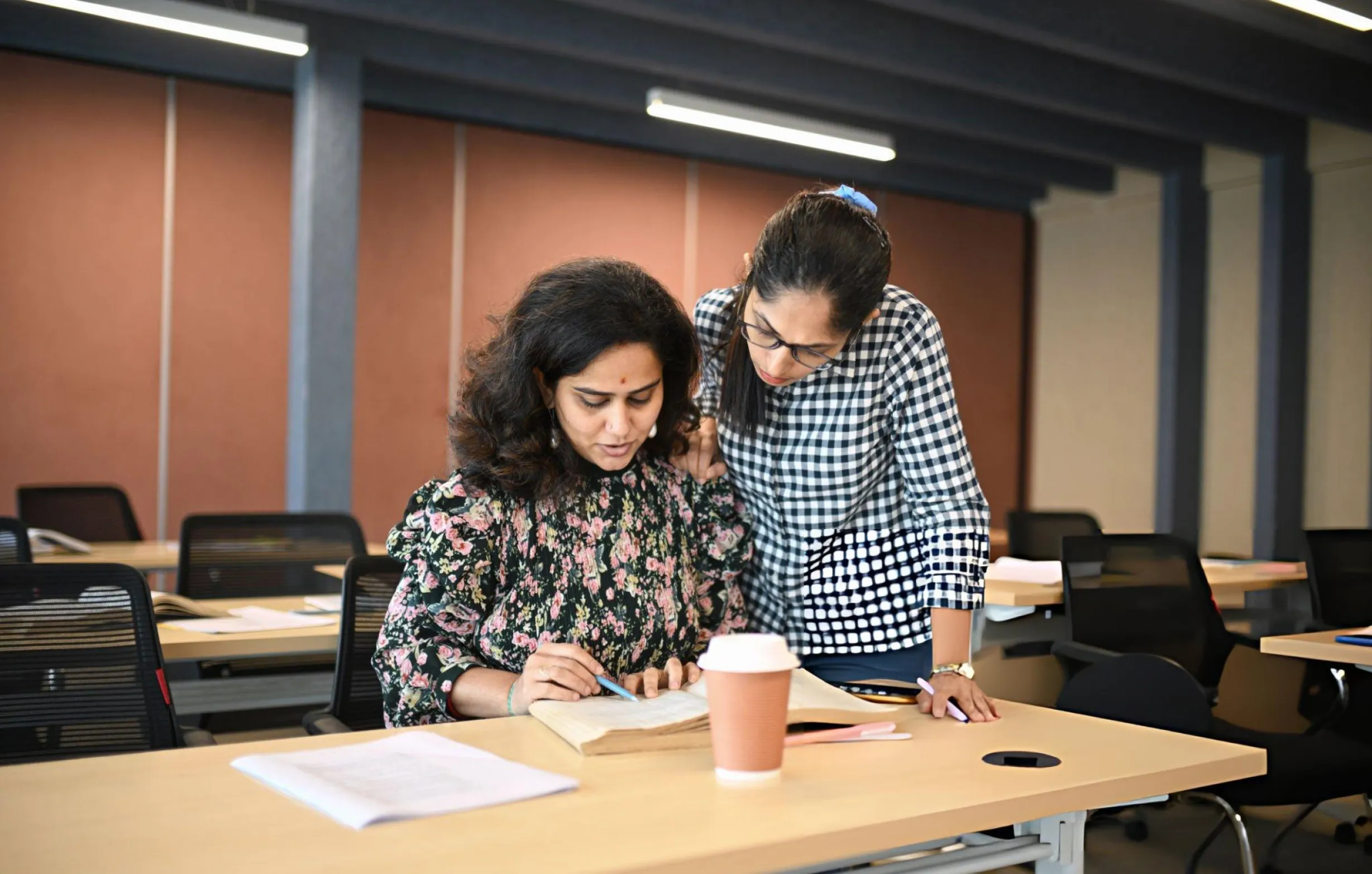 teachers helping each other in a teacher training course